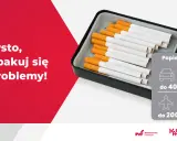 Popielniczka z papierosami i grafika z limitami ilości papierosów do przewozu.